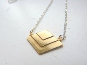 Image of Collier chevron laiton doré/laiton chromé or blanc