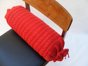 Image of Hand Knit Bolster 45 x 17cm - red cable knit