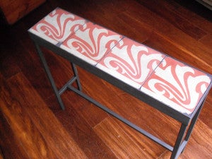 Image of Swirly red on light grey console