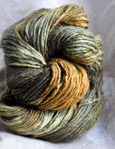 Image of whisper of the forest's sun. gliding yarn. merino/silk worsted.