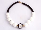 Image of Black Geometric Cube with White Sand and White Beads