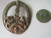 Image of German snake sword badge pin