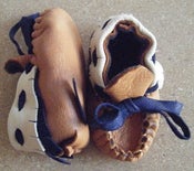 Image of brown with navy/bone fringe 