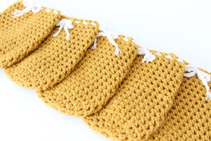 Image of Wine Bottle Cozy in Honey Mustard (Set of 5)