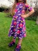 Image of Purple astronauts short sleeve skater dress