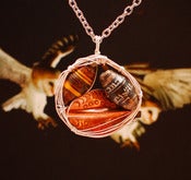 Image of Bird Nest Pendant with Copper Leaf