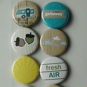 Image of getaway badge buttons