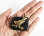 Image of Sparrow miniature music box pendant