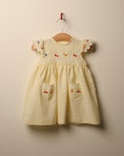 Image of c. 1970s yellow embroidered dress