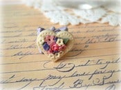 Image of Purple Filigree Ring with Cream Heart with Colorful Flowers 