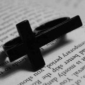 Image of SIDEWAYS BLACK DOUBLE FINGER CROSS RING