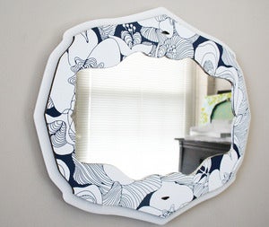 Image of curly bracket mirror - blue bloom