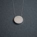 Image of silver disk necklace