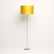 Image of Yellow silk lampshade on floor standing lamp stand