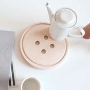 Image of snug.buttonboard