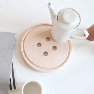 Image of snug.buttonboard