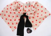 Image of red dotted mini cloak