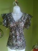 Image of sheer black floral top
