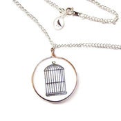 Image of Thaumatrope Illusion Necklace - Black on White Edition