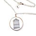Image of Thaumatrope Illusion Necklace - Black on White Edition