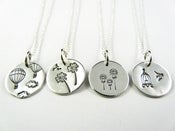 Image of Theme stamped necklaces