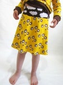 Image of Yellow Happy Mushrooms tennis skirt