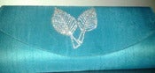 Image of Haute Latitude turquoise crystal leaf clutch