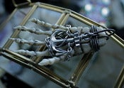Image of Skeleton hand anchor pendant