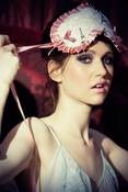 Image of 'Paris Paris'  sleep mask in pink silk with Eiffel Tower and pink satin  trim