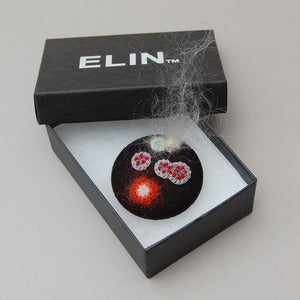 Image of Linen brooch with crochet moulds