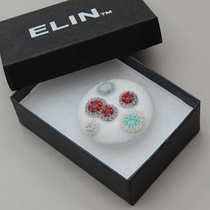 Image of White linen brooch with crochet moulds