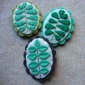 Image of sprout brooches