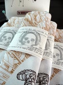 Image of Tea Towel: DJ Food/Henry Flint 'Helmet Polishing Cloth'