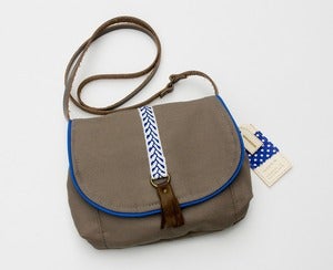 Image of --S OL D O U T -- small cross-body bag in taupe with royal + white woven trim and leather tassel
