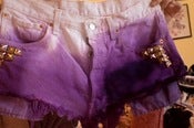 Image of Studded dip-dyed levi shorts. 