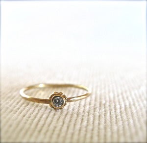 Image of beaded 14k gold and diamond solitare ring