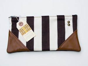 Image of -SOLD OUT- a chocolate+vanilla striped zipper clutch with leather corners