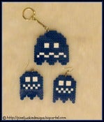 Image of pacman ghost keychain and earrings