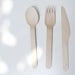 Image of wooden party cutlery
