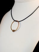 Image of Tied Copper Ring Pendant