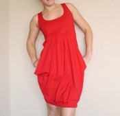 Image of I LIKE YOU. THE CLASSIC RED DRAPED POCKET DRESS