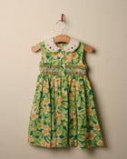 Image of c. 1980s ladybird and floral print smocked dress