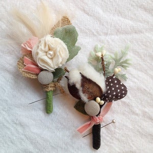 Image of cotton or feather boutonniere