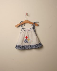 Image of c. 1970s watering can top and bloomers