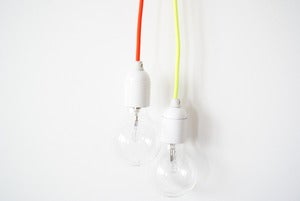Image of *DE RETOUR* Lampe baladeuse Trés Tendance (Orange fluo et jaune Néon)