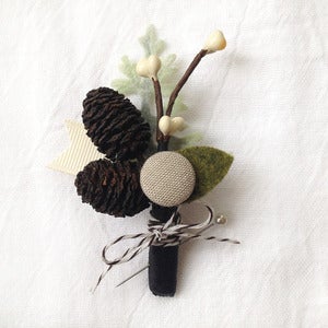 Image of pine cone boutonniere