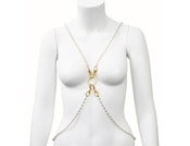 Image of Small X pearl body jewelry