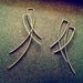 Image of Kyyote delicate wisp earrings