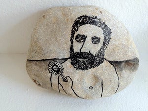 Image of Man Sees Himself In Flower