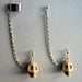 Image of  Single Howlite Turquoise Skull Chain with Earring Cuff